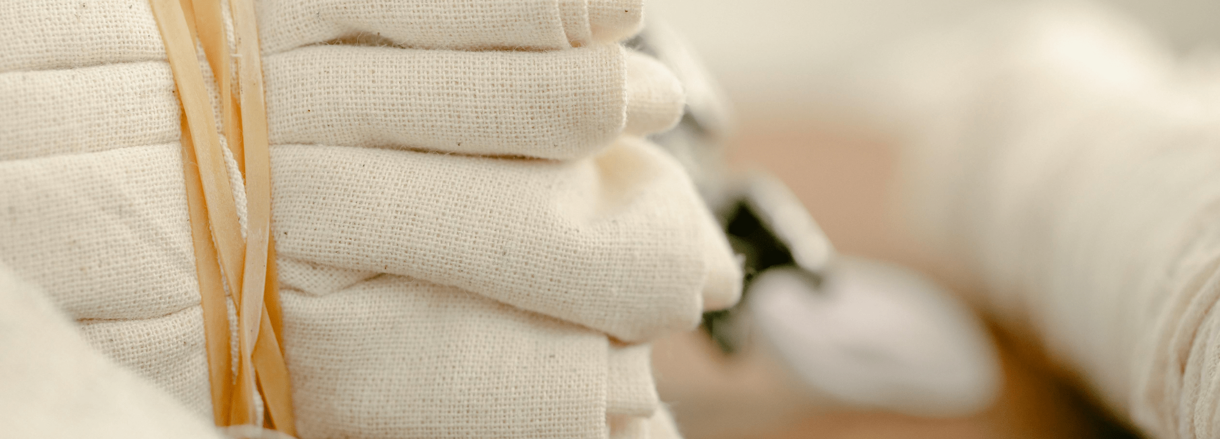 A selection of bed sheets displayed on a table.
